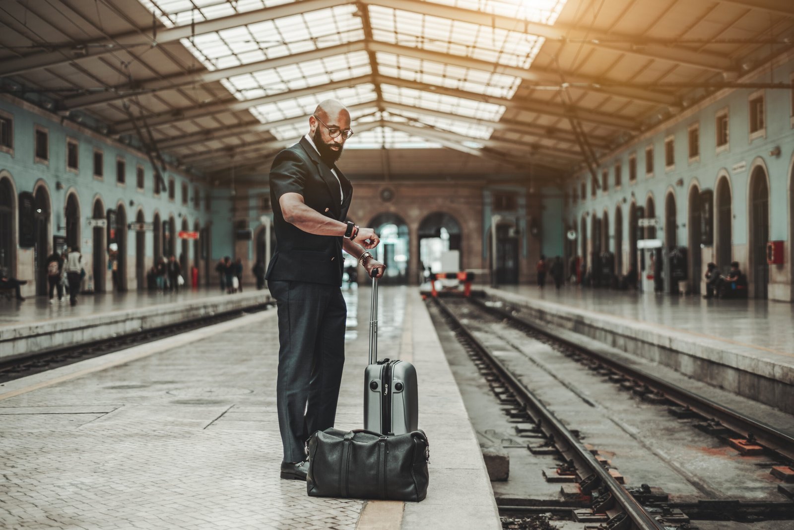 African man on the railroad platform